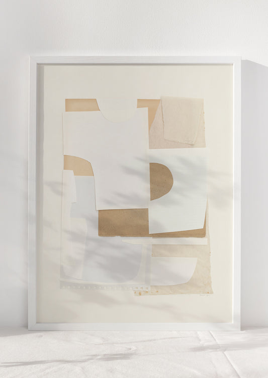 An abstract artwork with layers of cutout paper in neutral tones.