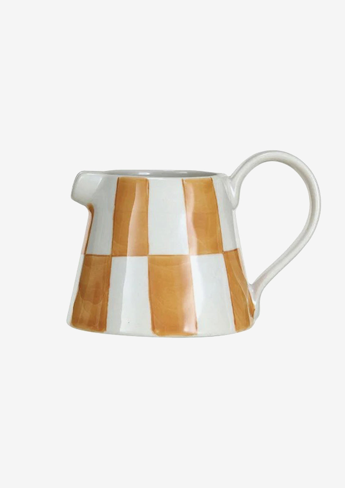 A small mini creamer pitcher with ochre check pattern.