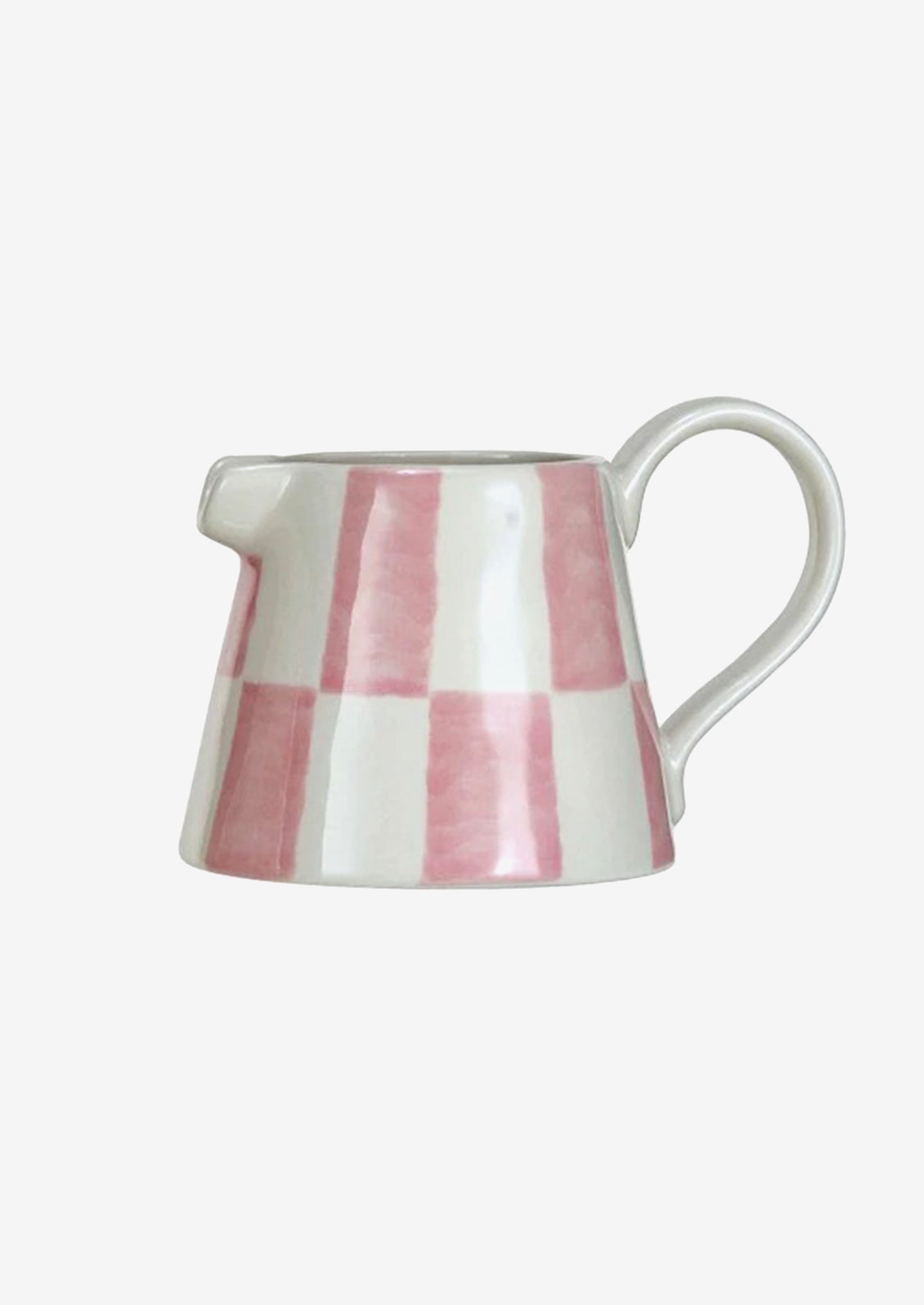 A small mini creamer pitcher with pink check pattern.