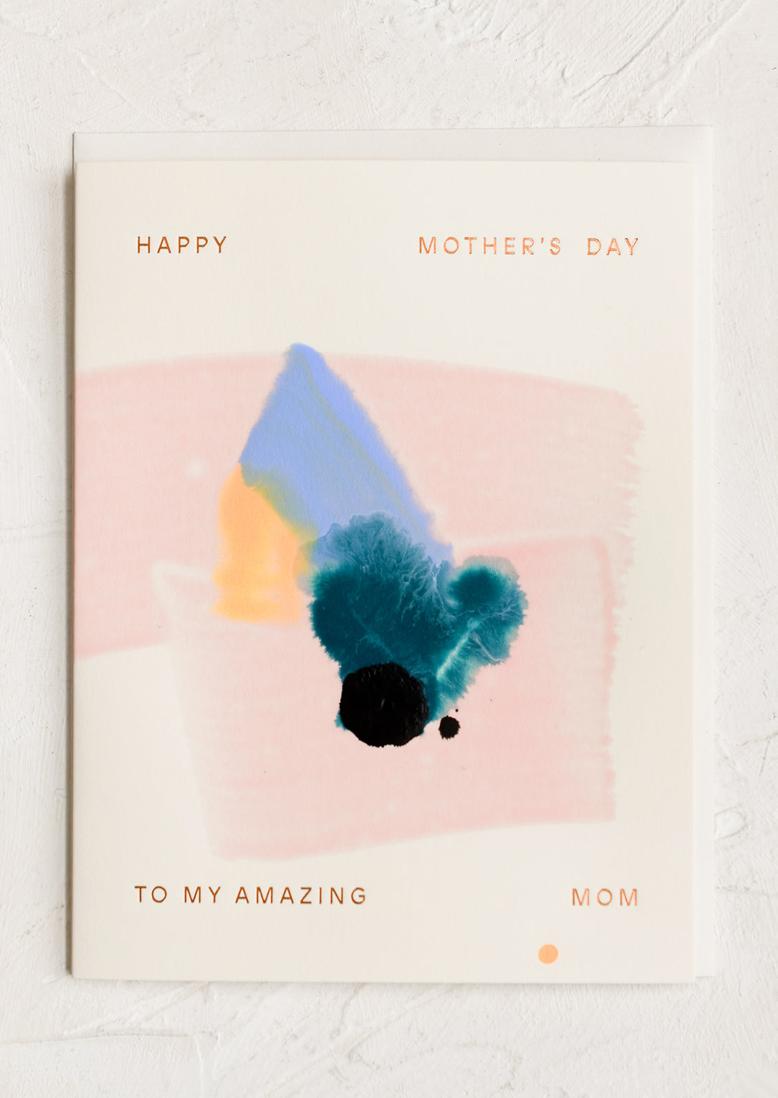 An abstract pattern card with text reading "Happy Mother's Day To My Amazing Mom".