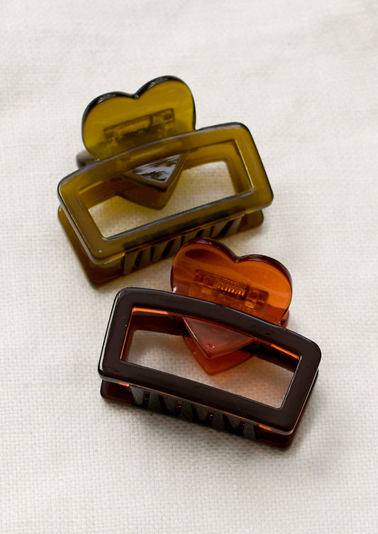 Rectangular hair claw clips with heart shape in olive and dark red.