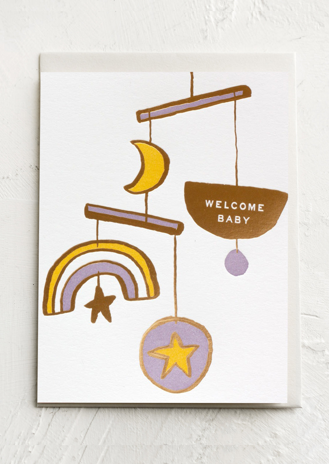 A card with illustration of baby mobile, text reads "welcome baby".