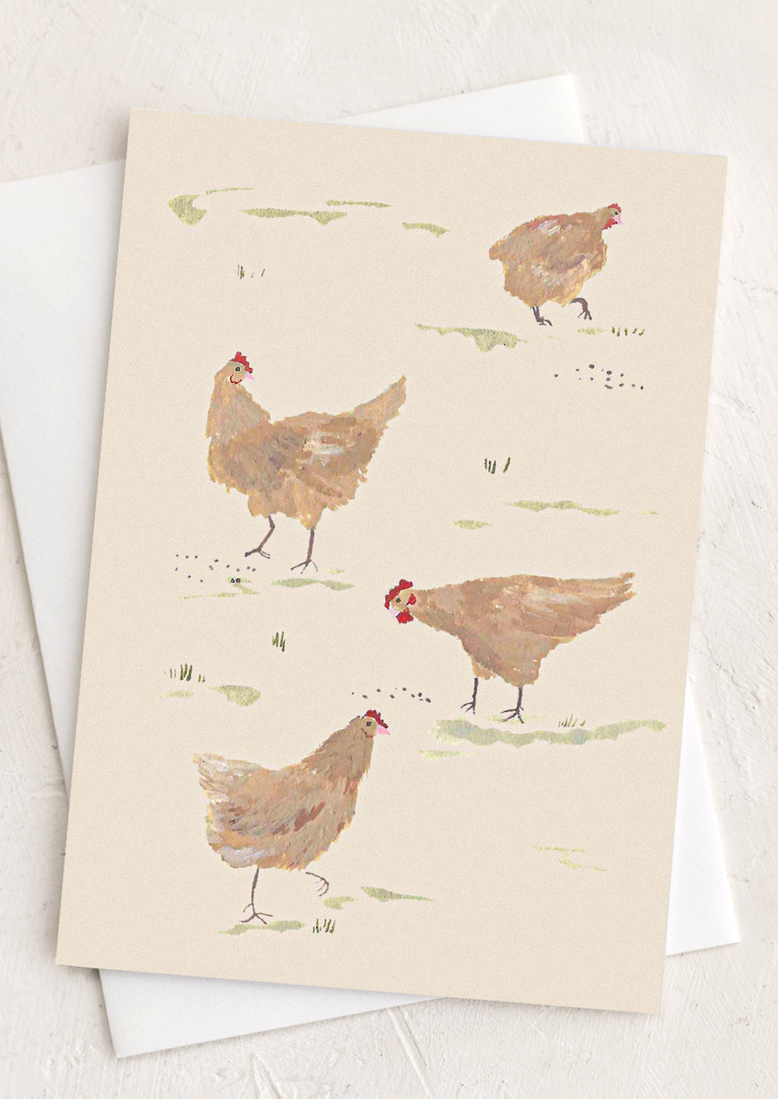 A greeting card illustrated with grazing chickens.