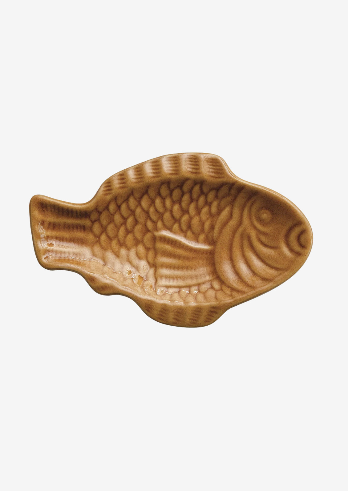 A fish shaped ceramic dish in biscuit tan.