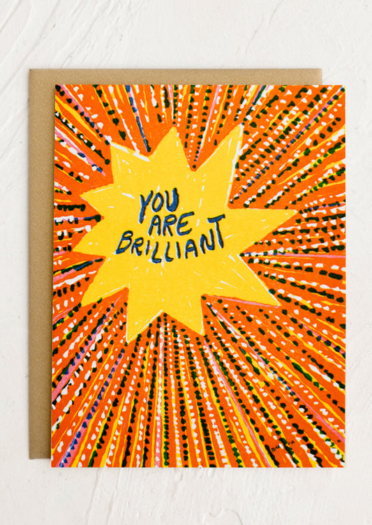 A yellow star print card, text reads "You are brilliant".