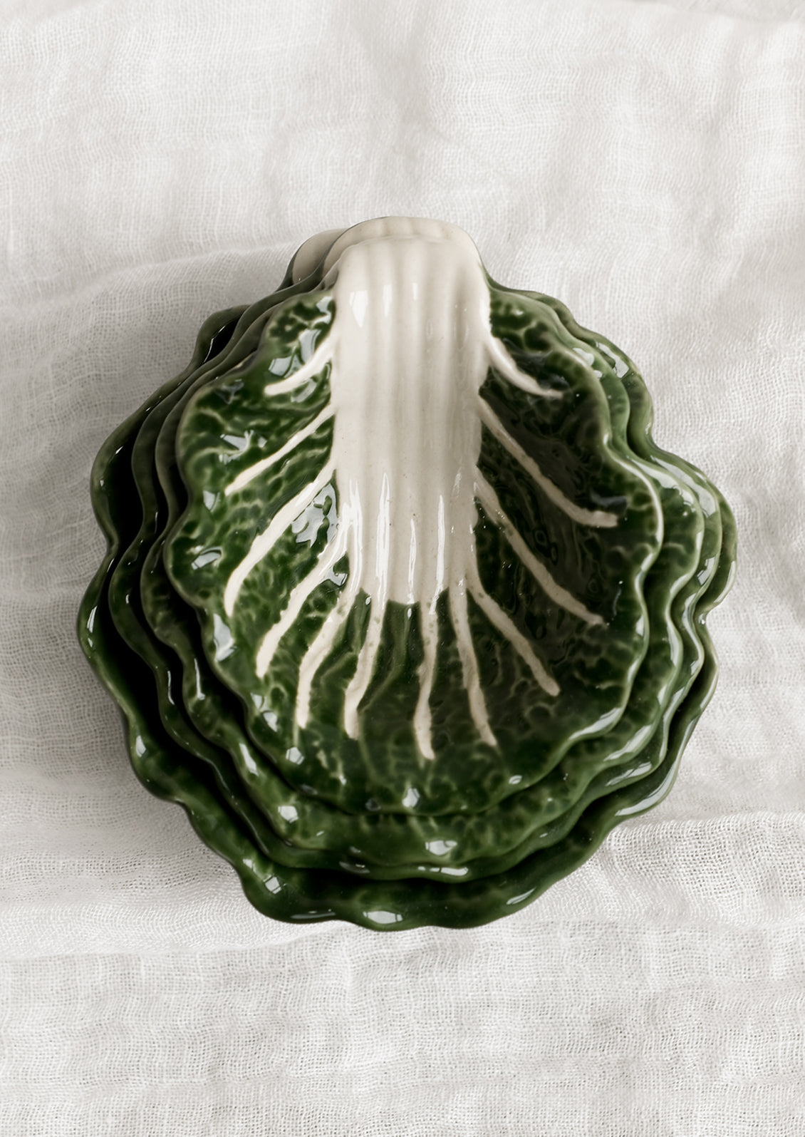 Cabbageware style ceramic bowls that look like green cabbage.