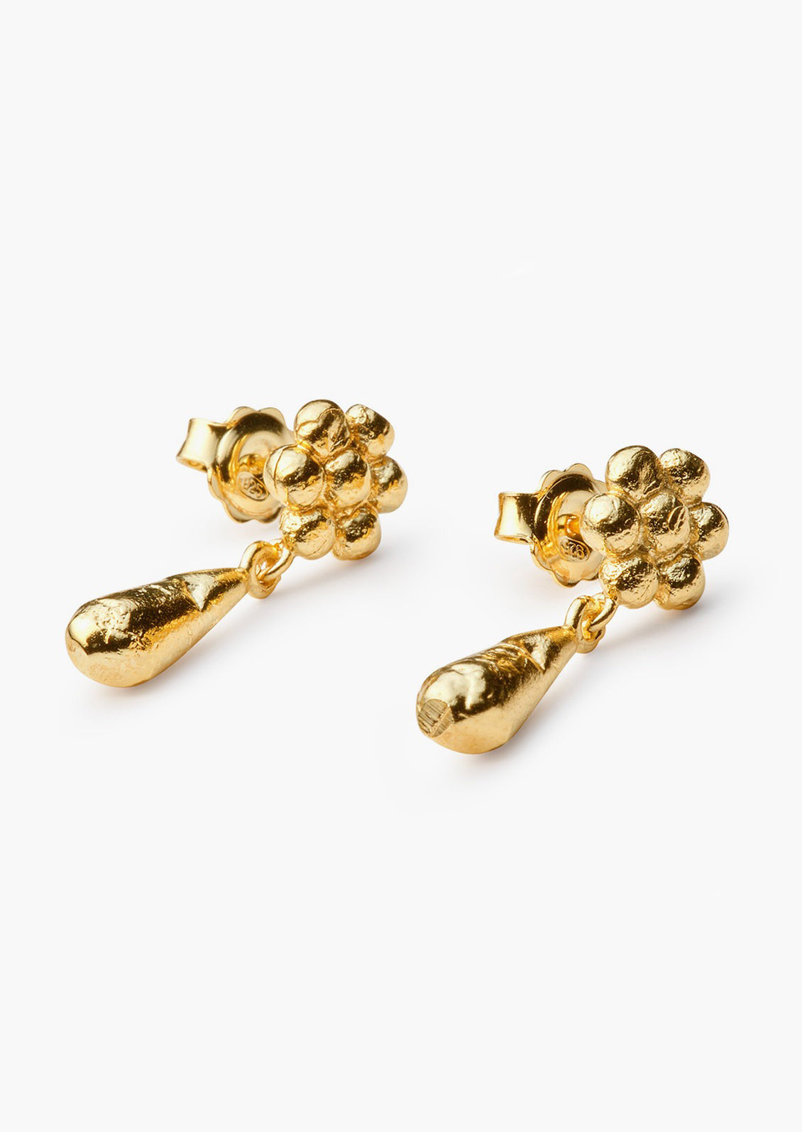 A pair of gold earrings with flower post and teardrop charm.