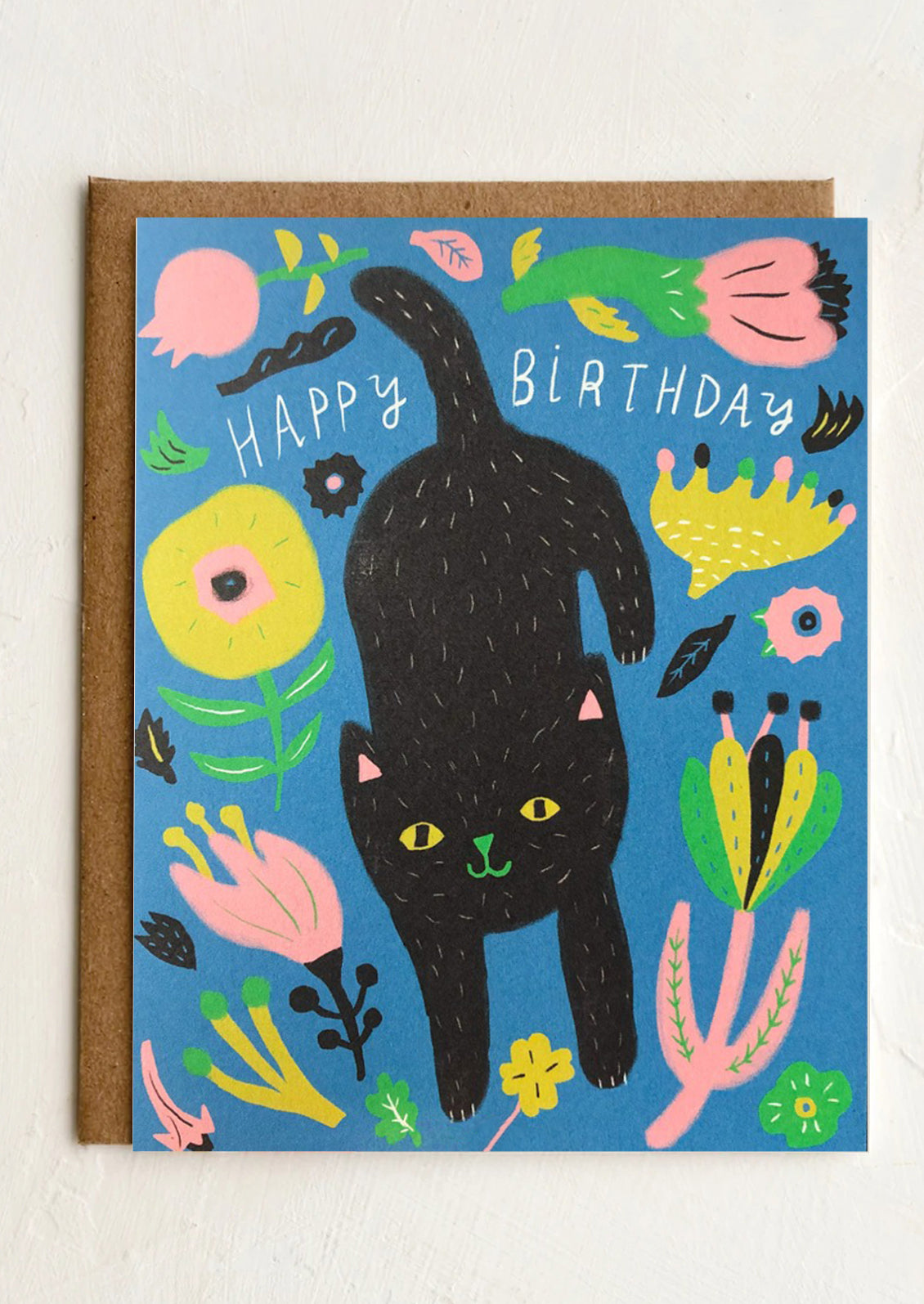 A card with illustration of black cat with flowers, text reads "Happy Birthday".