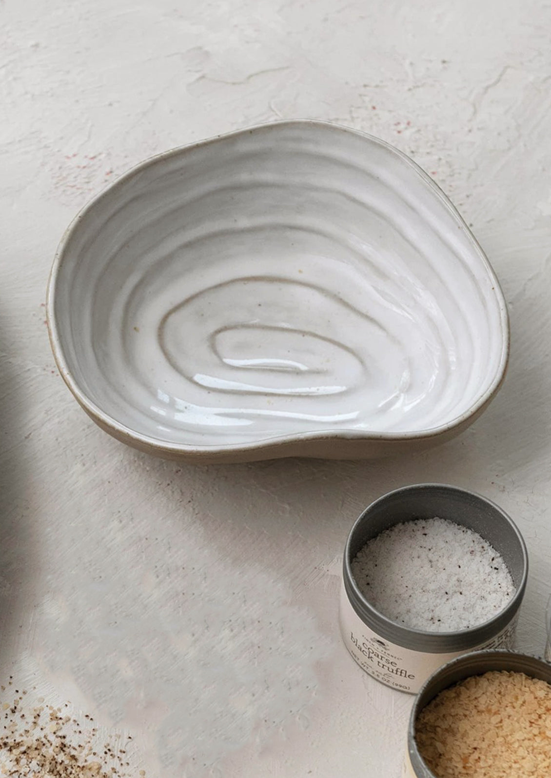 A serving bowl in the shape of a shell.