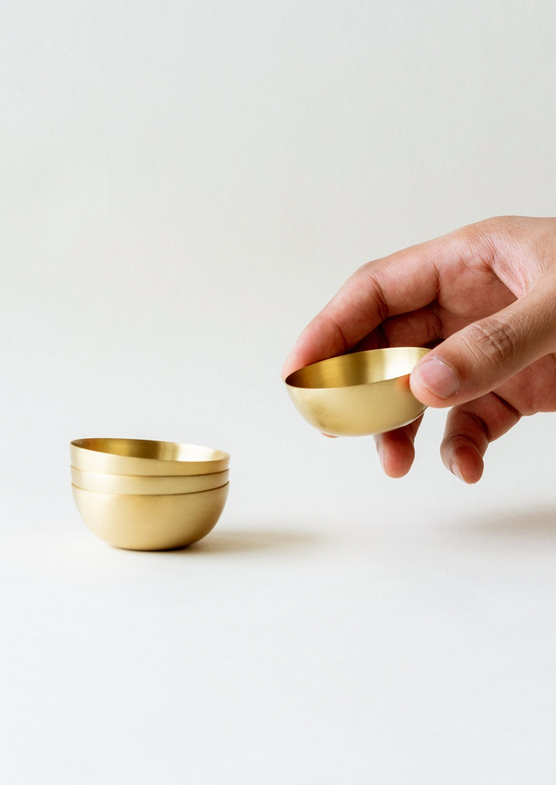 Mini brass pinch bowls.