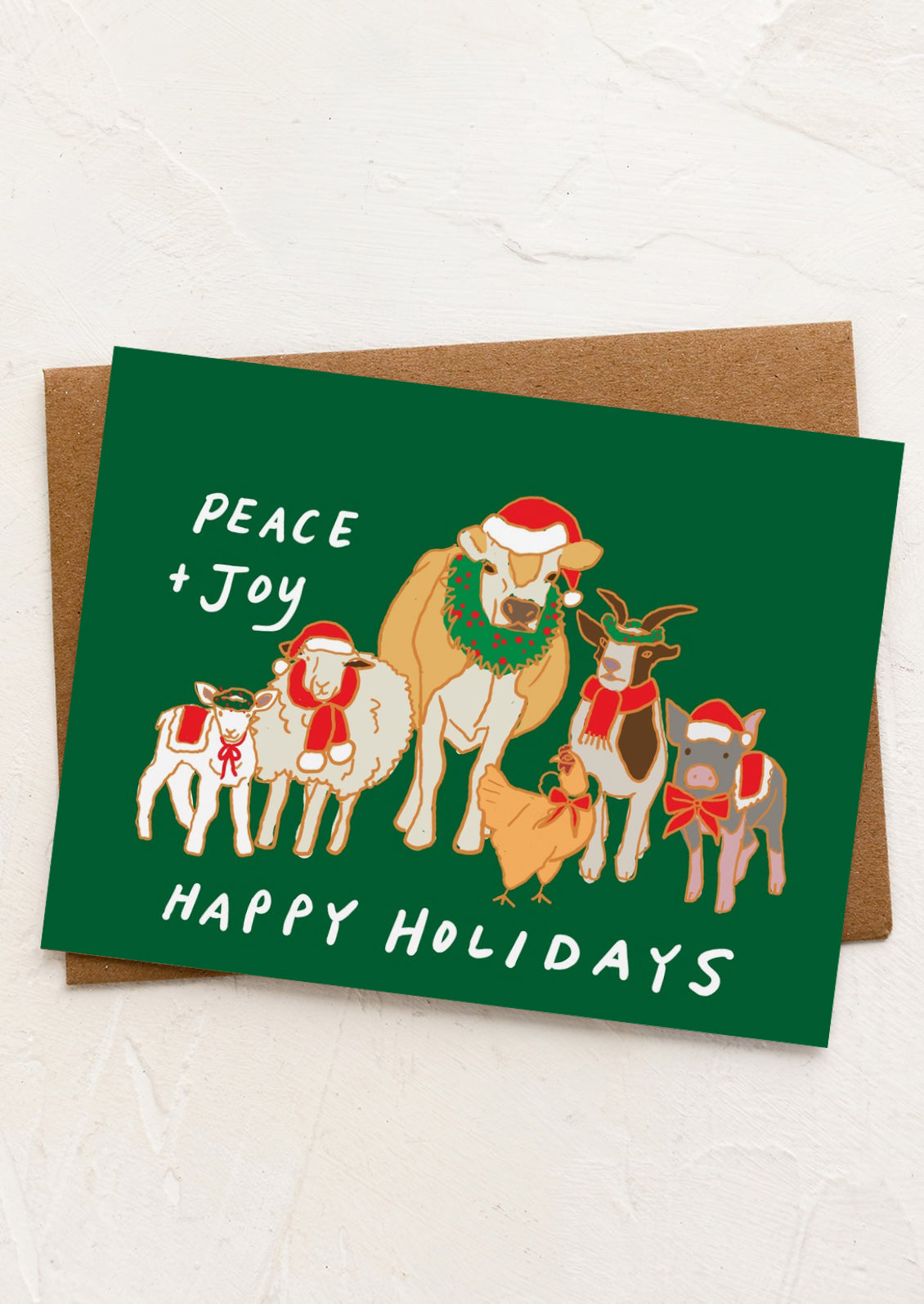 A card with illustration of farm animals wearing santa hats, text reads "Peace and joy, Happy Holidays".