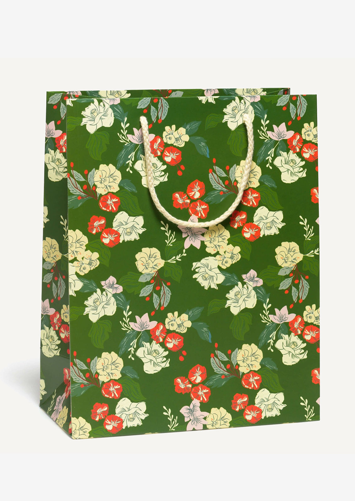 A large printed gift bag in green with red and cream floral print.