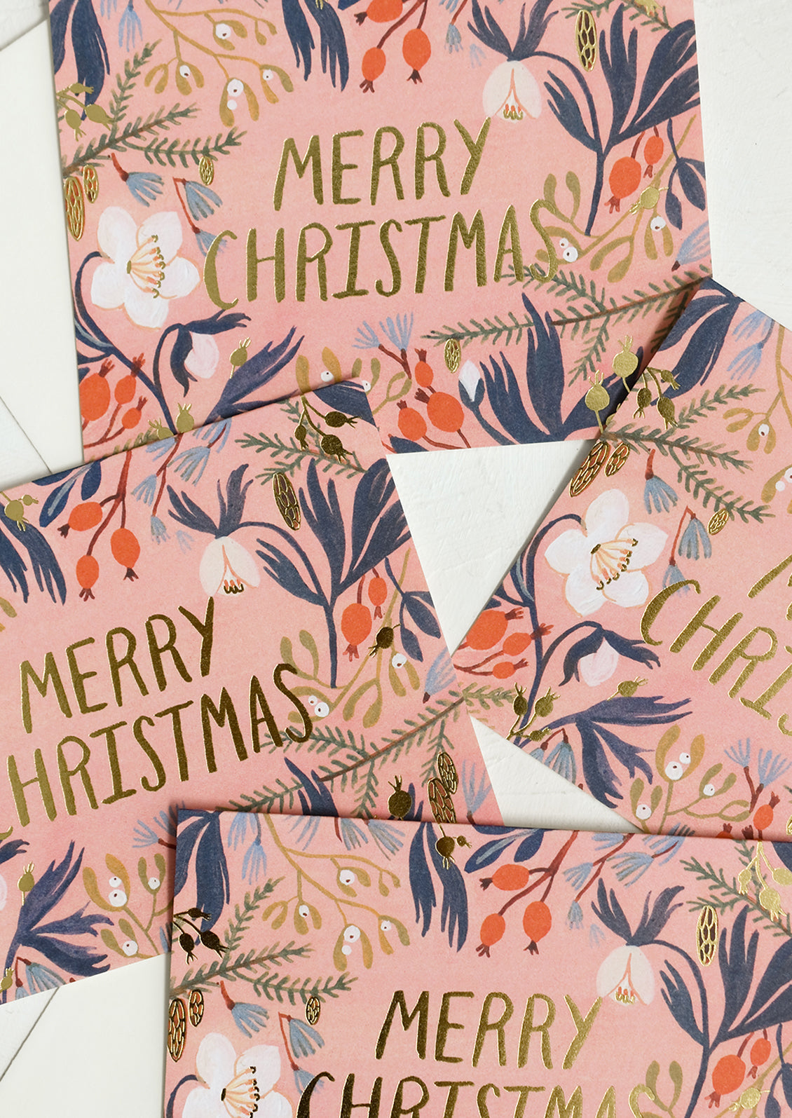 A set of pink floral print cards reading "Merry christmas".