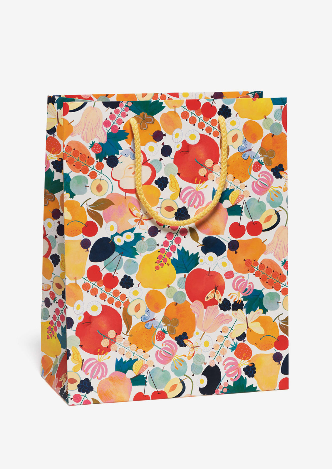 A printed gift bag with fruit and floral print.