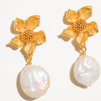 3: A pair of earrings with three dimensional gold flower post and dangling baroque pearl.
