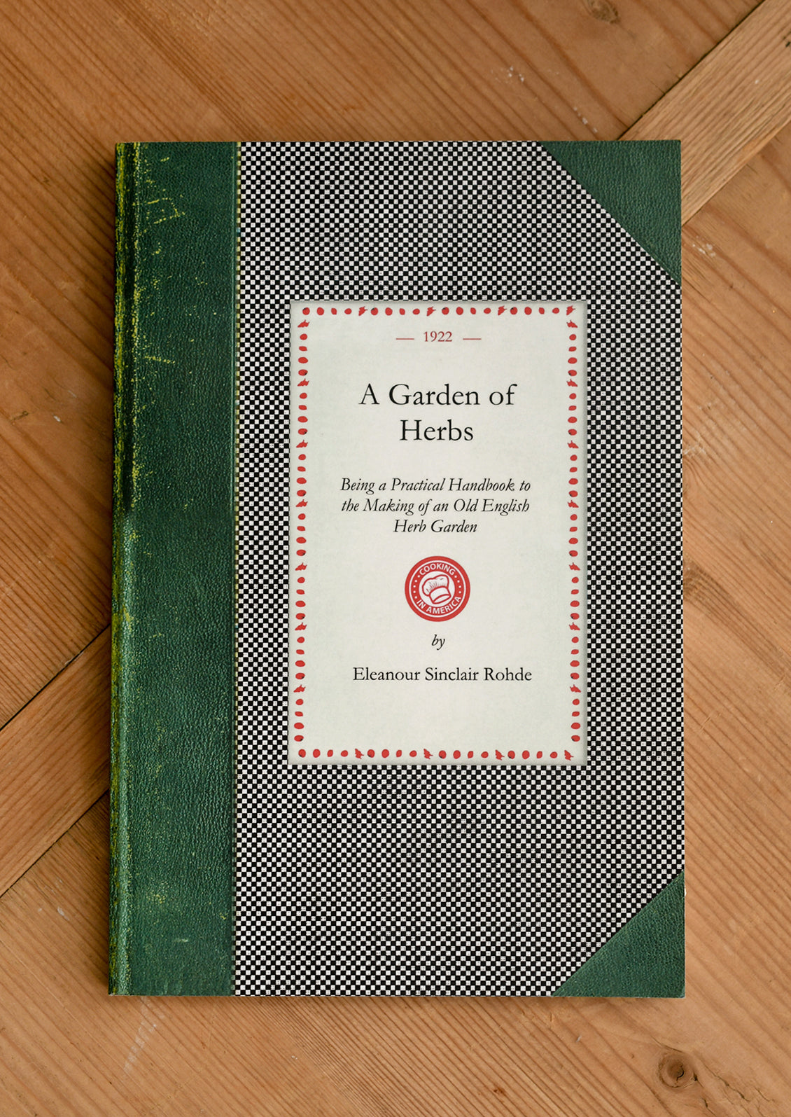 A book titled "A Garden of Herbs".