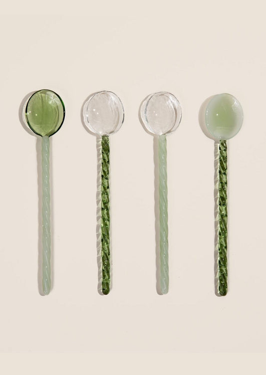 Clear and green glass teaspoons.
