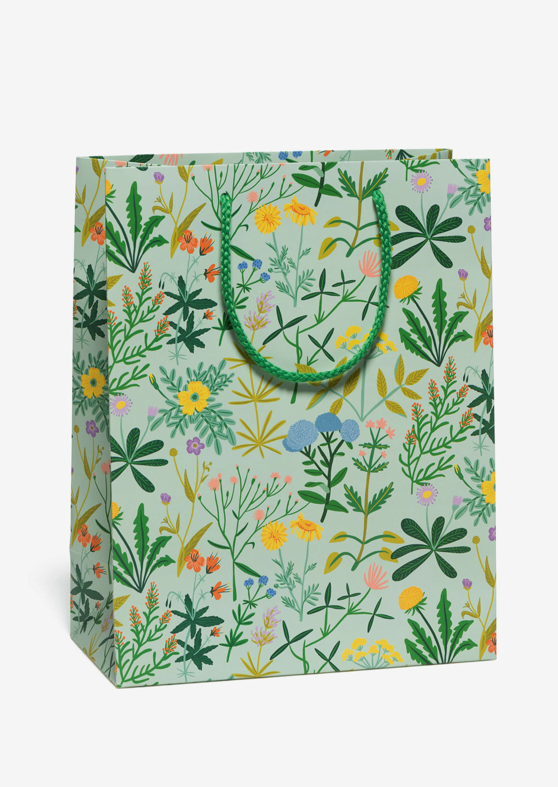 A printed gift bag with colorful flowers on mint background.