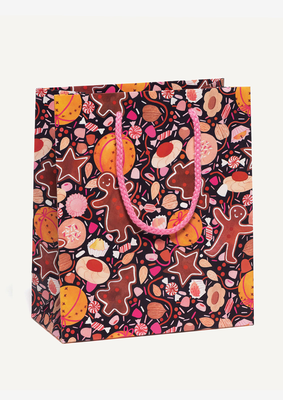 A medium printed gift bag with pink, orange and brown holiday cookie print.