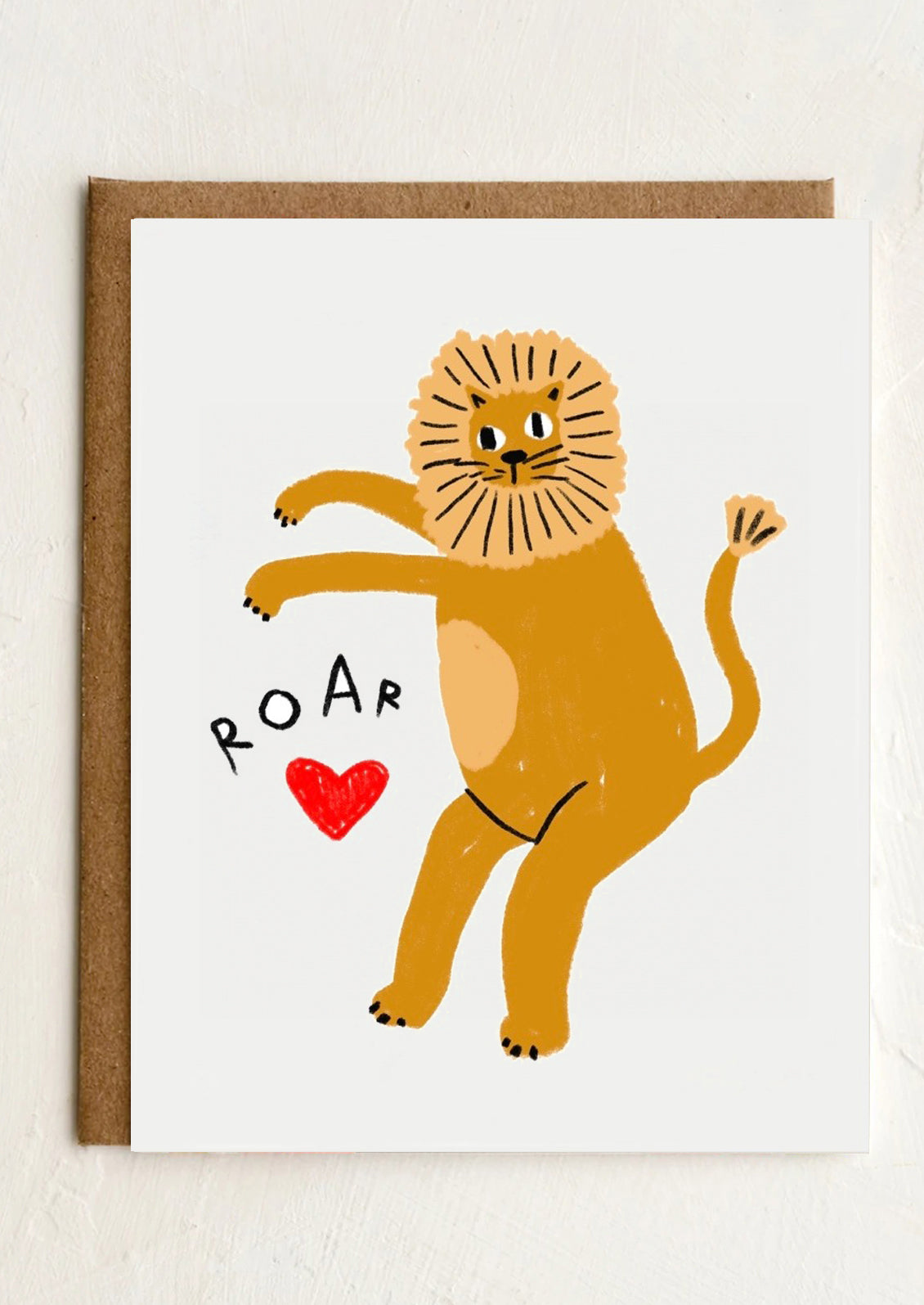 A greeting card with illustration of lion and red heart, text reads "Roar".