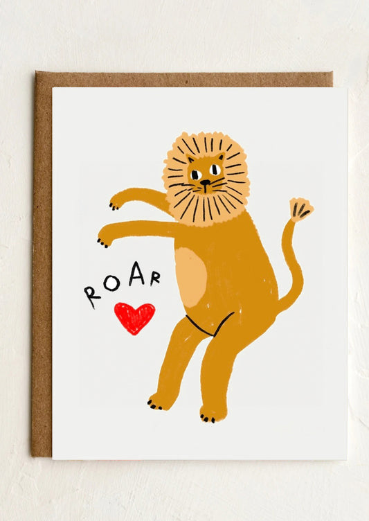 A greeting card with illustration of lion and red heart, text reads "Roar".