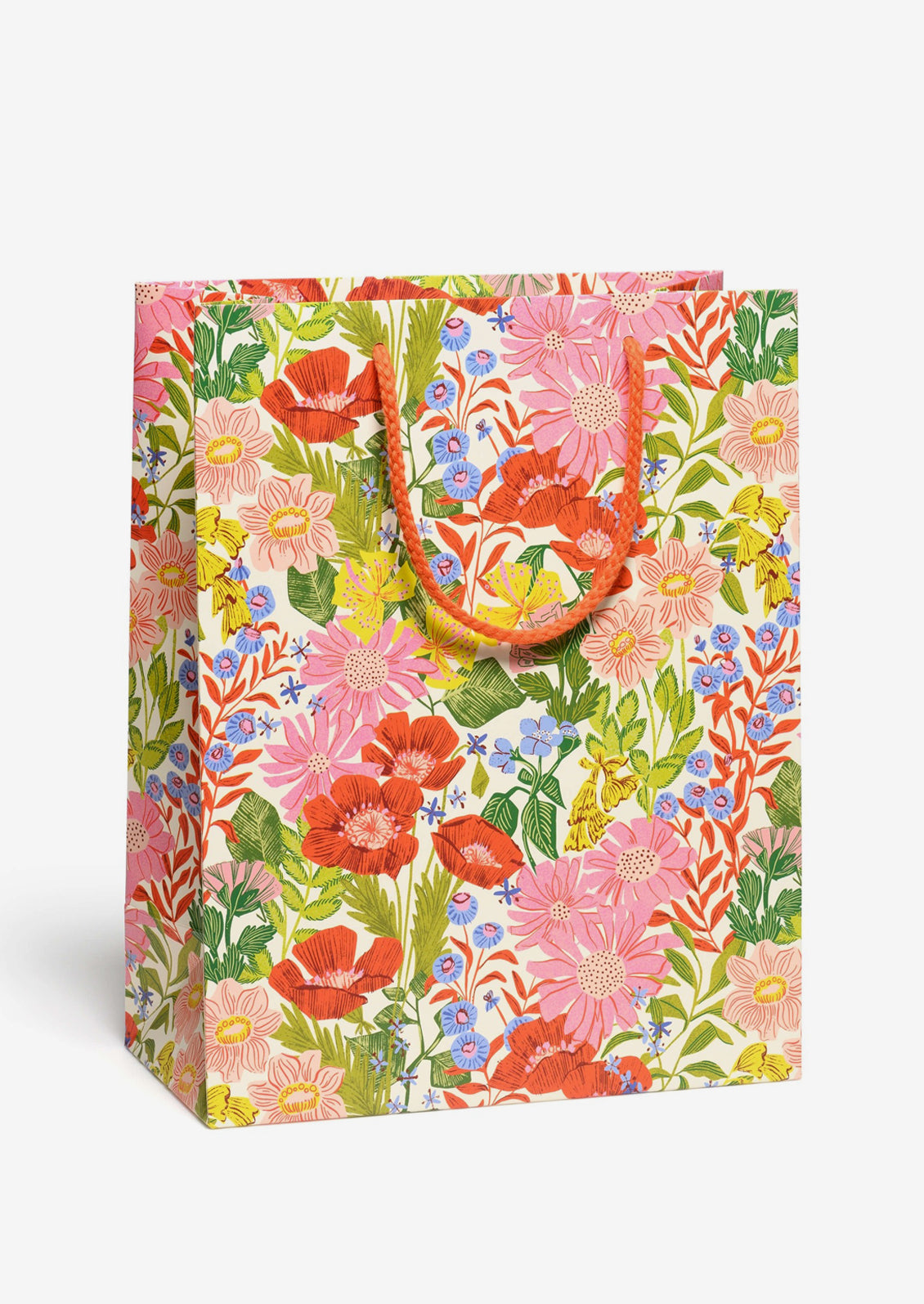 A printed gift bag with multicolor floral garden print.