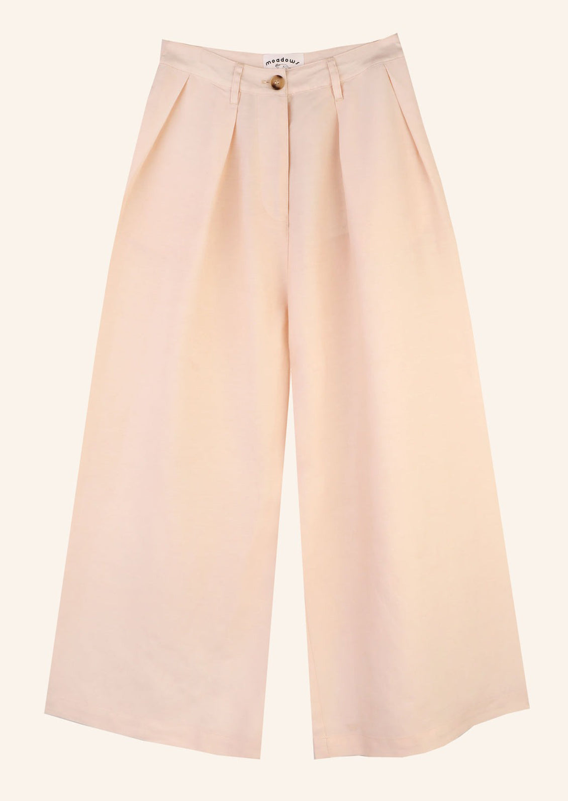 Light pink wide leg pants with pleat detail at waist.