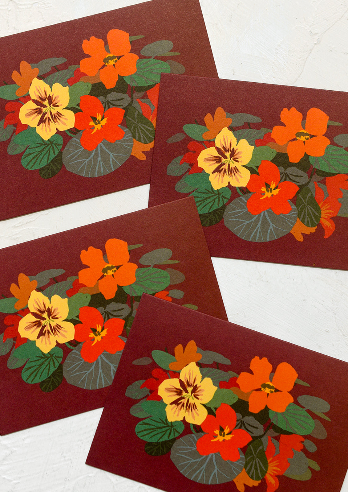 A set of brown nasturtium printed greeting cards.