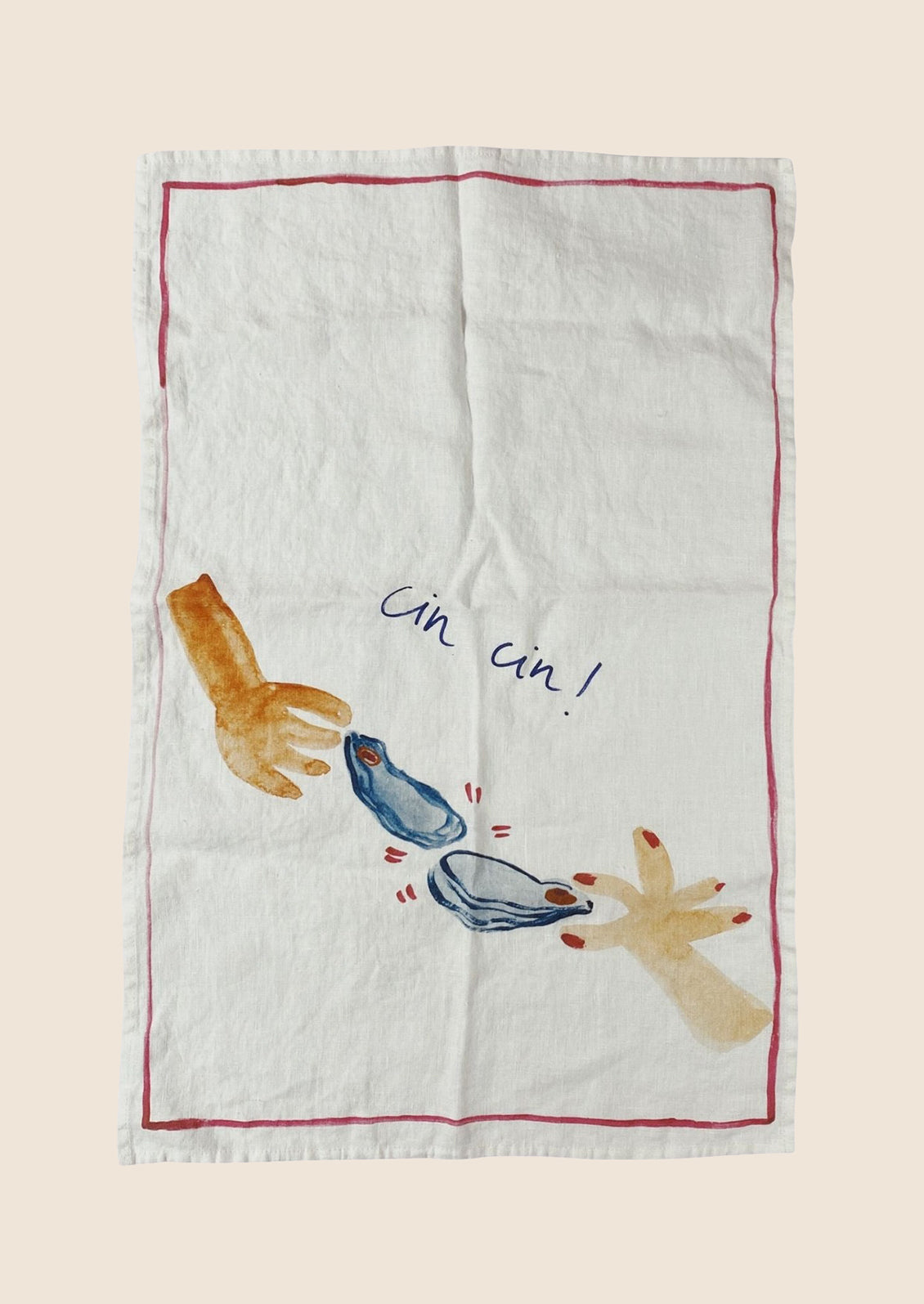 A white linen tea towel with Cin Cin oyster cheers graphic and text.