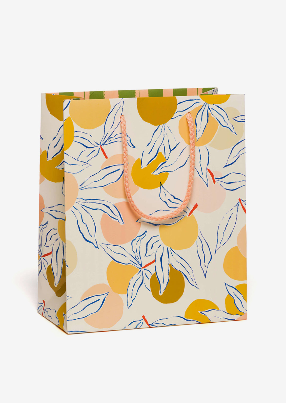 A printed gift bag with peaches print.