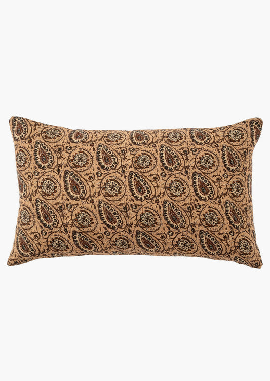 A lumbar throw pillow in peach paisley block print pattern.