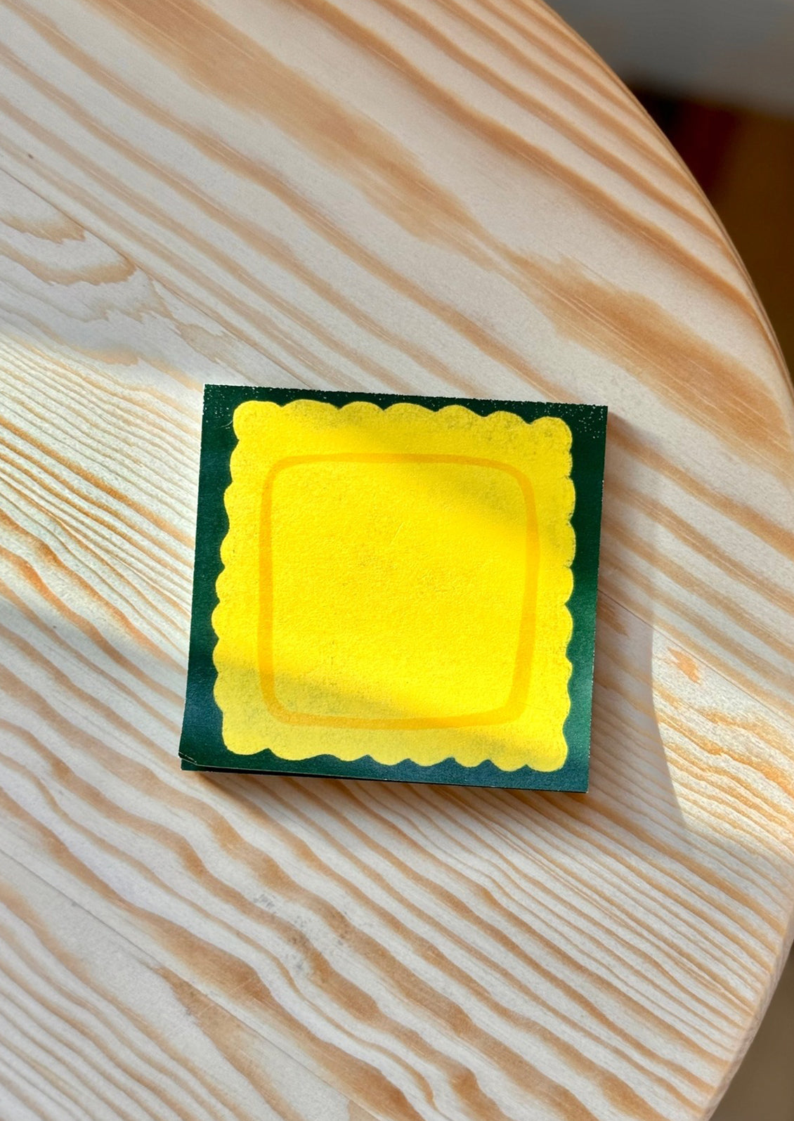 A stack of sticky notes with printed pasta theme.