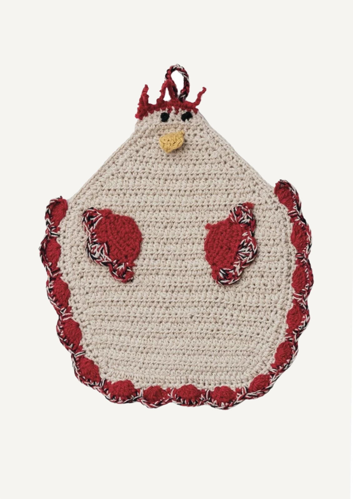 A crocheted potholder in the shape of a chicken, with red detailing.