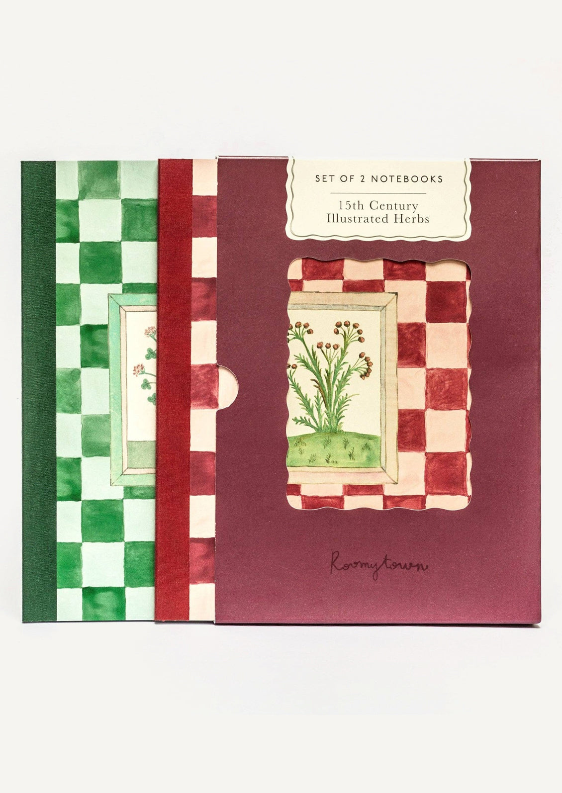 Notebooks in red and green checker prints with botanical illustrations.