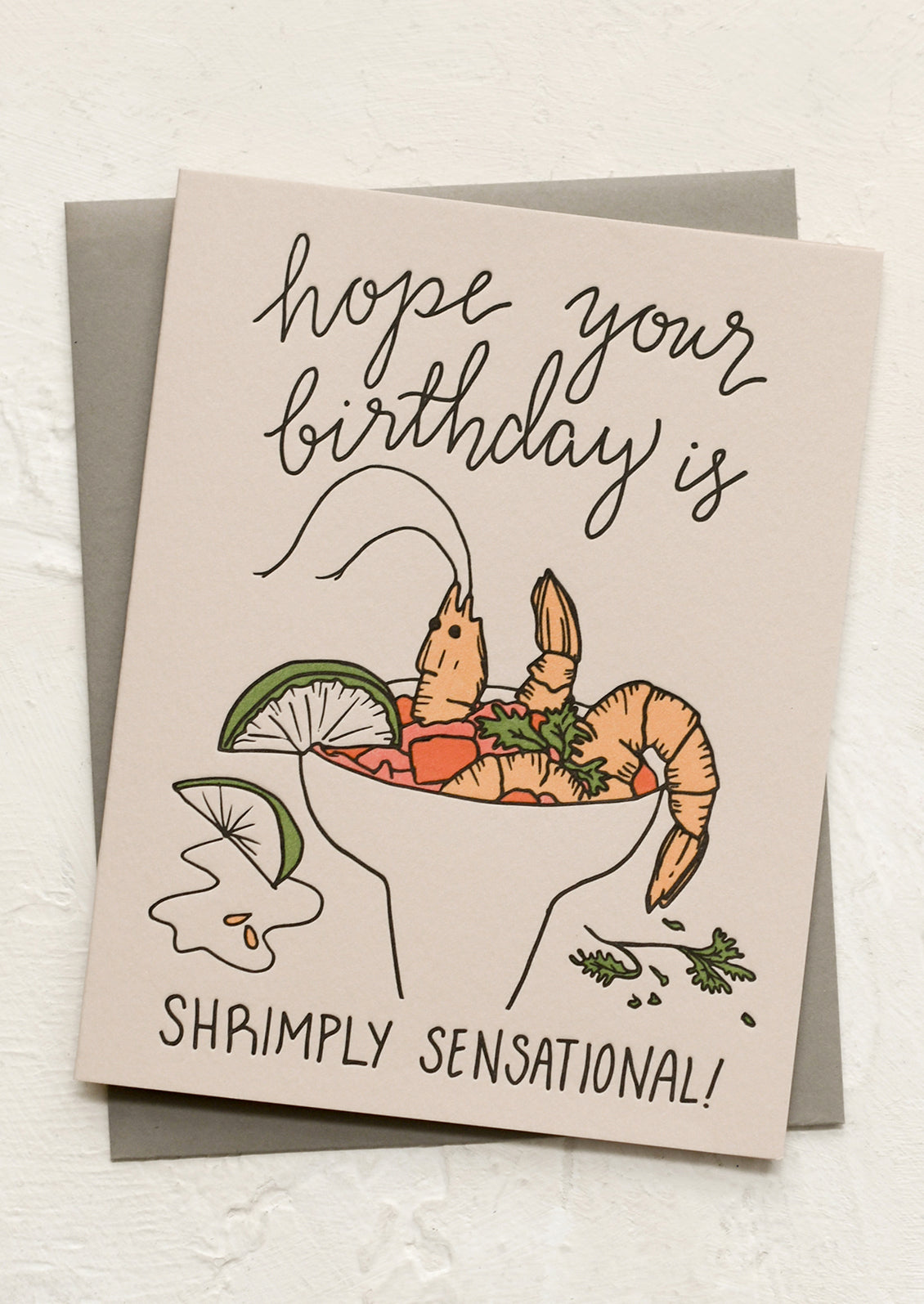 A card with shrimp cocktail illustration, text reads "Hope your birthday is Shrimply Sensational"!