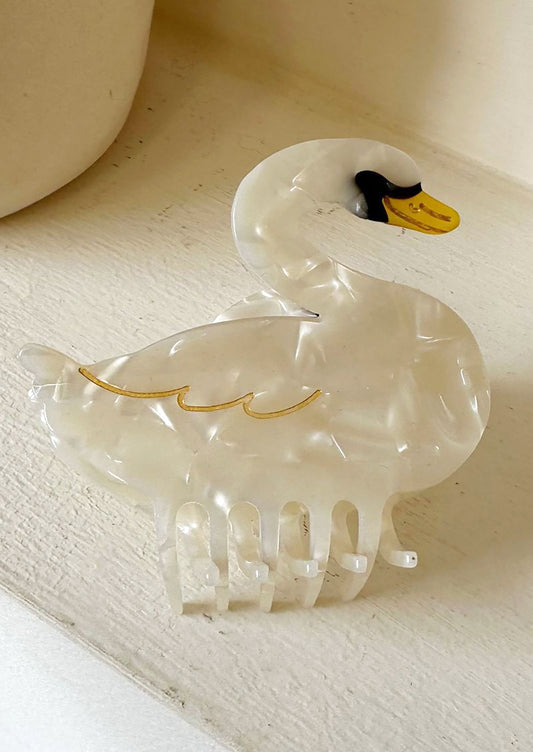 A swan shaped hair claw.