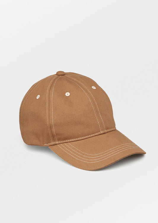 A brown color baseball cap with contrast white stitching.