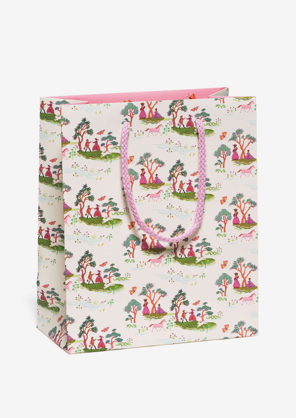 A printed gift bag with whimsical toile print on white background.