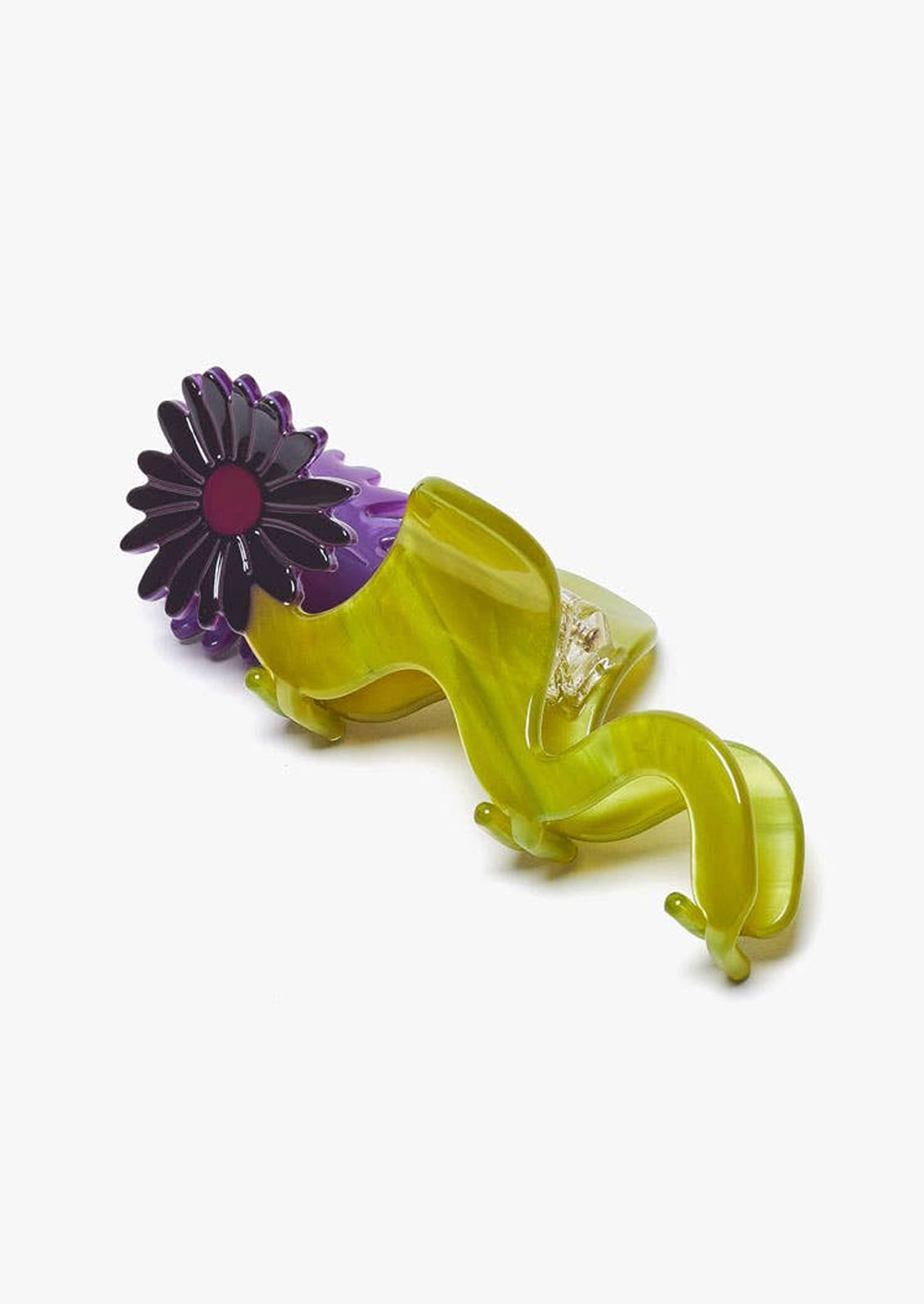 A wavy green hair claw with purple flower.