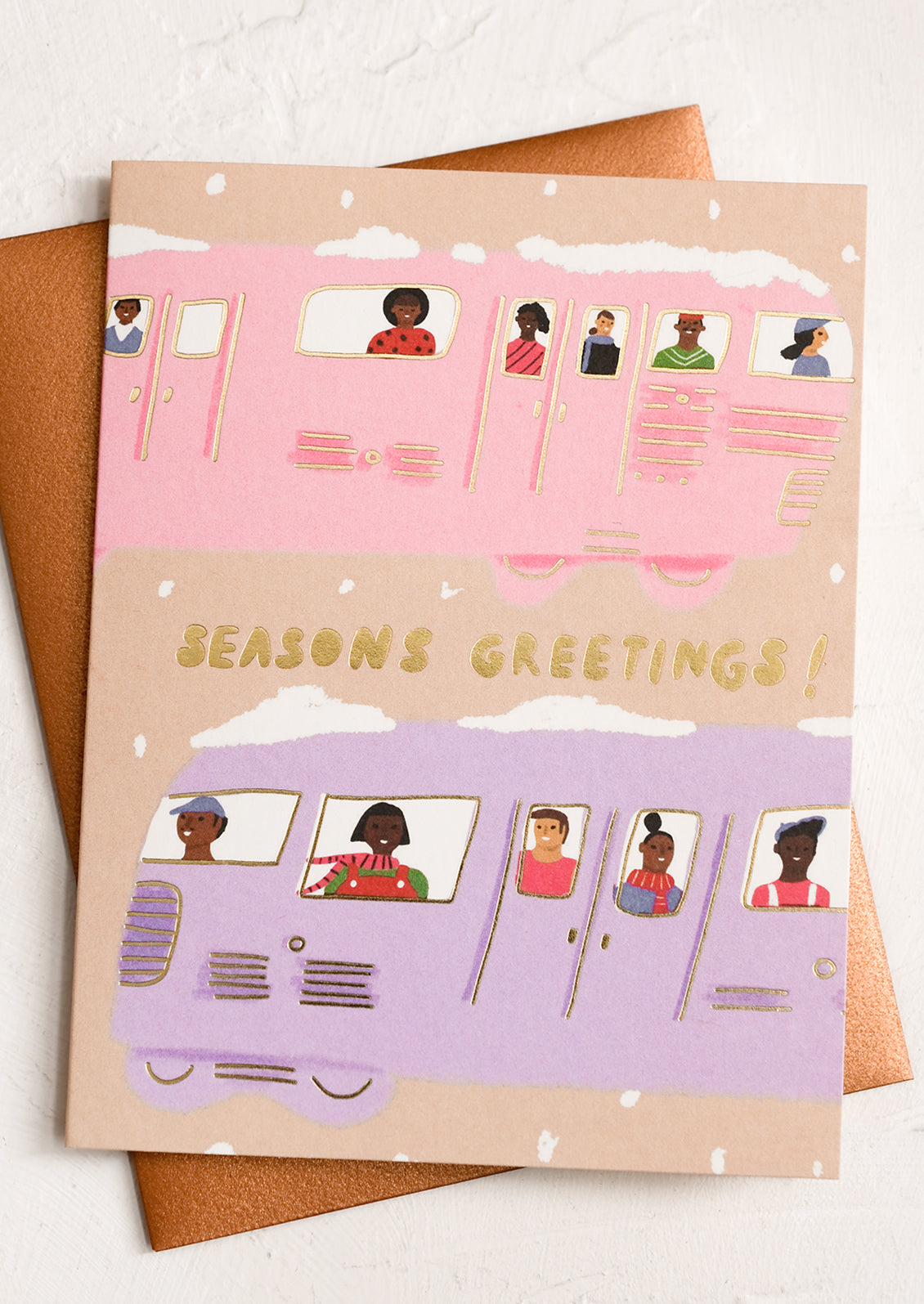 A card reading "Season's Greetings!" with illustration of people on a train.