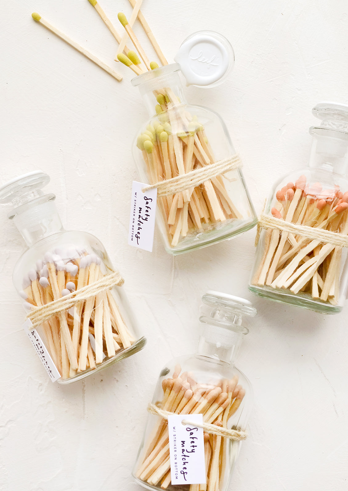 Safety matches in vintage style glass apothecary jars, with four match tip color options.