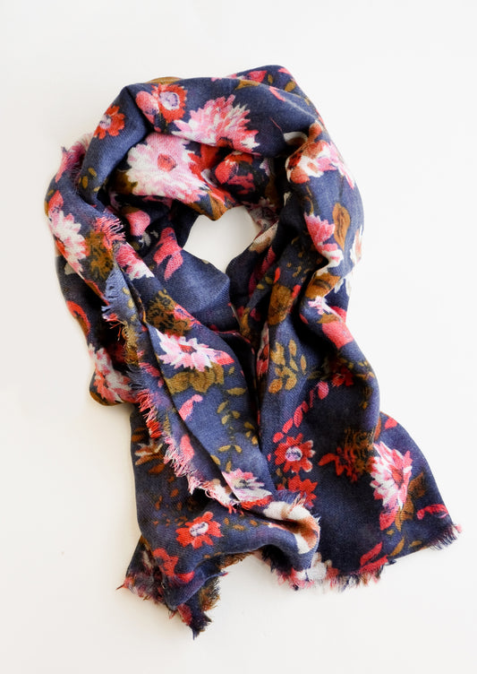 Wool-cashmere scarf with dark blue background and multi-colored pink and red floral pattern 