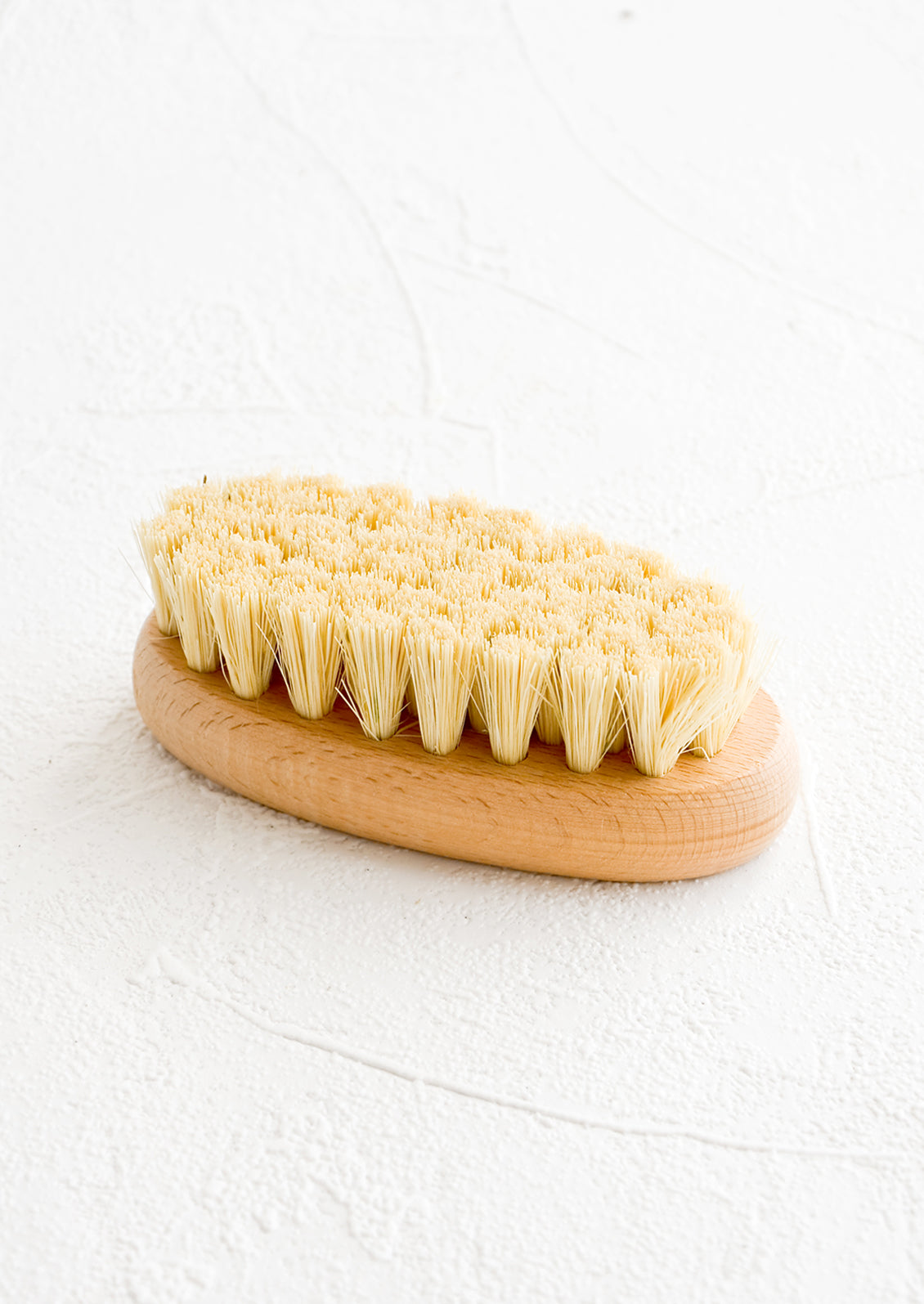 Oval shaped beechwood dish brush