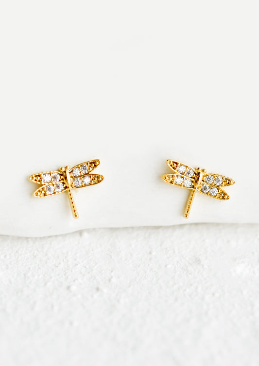 Tiny stud earrings in the shape of dragonflies with crystal wings.