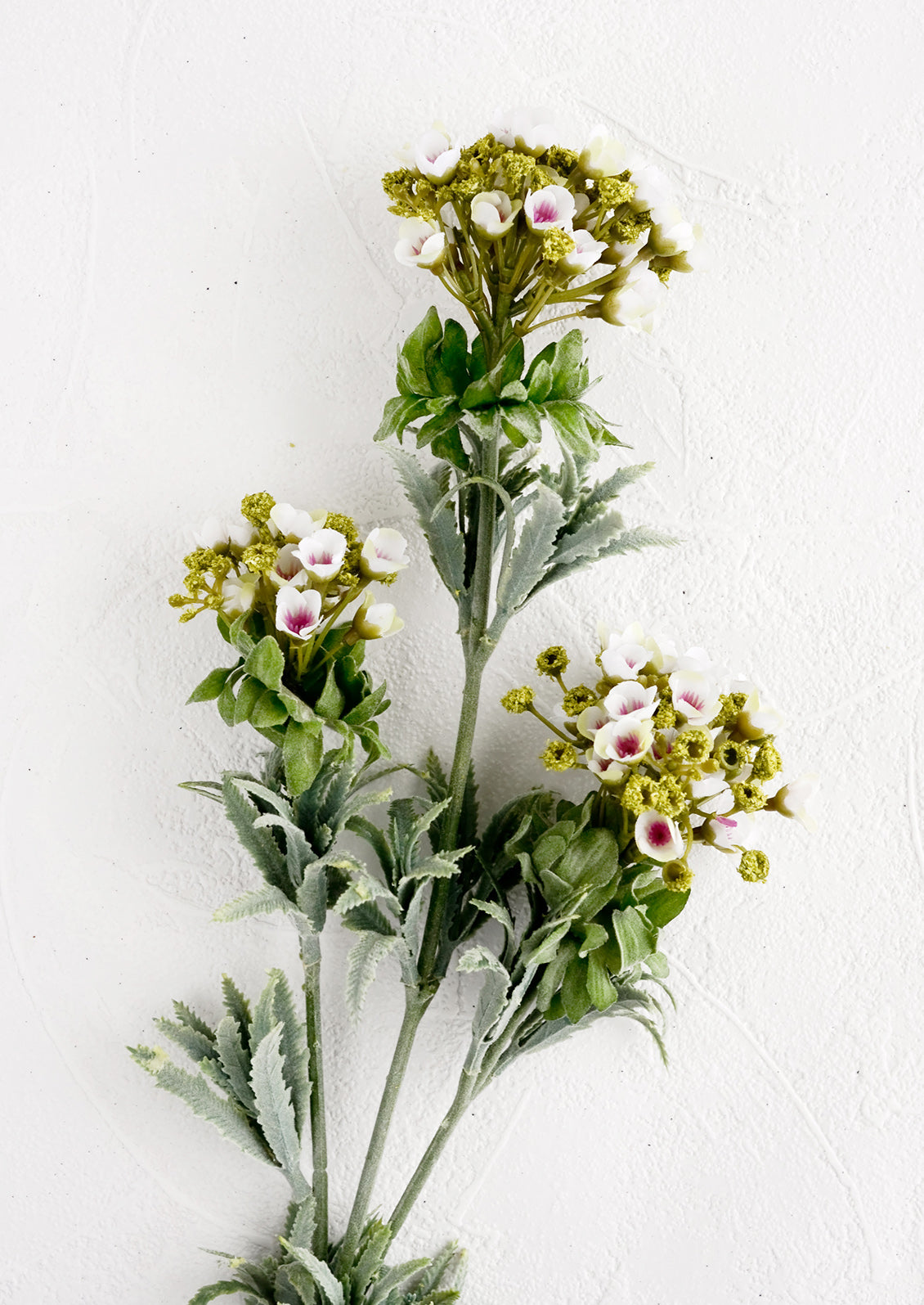 A faux alyssum spray.