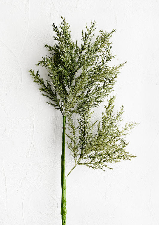 A faux greenery stem.