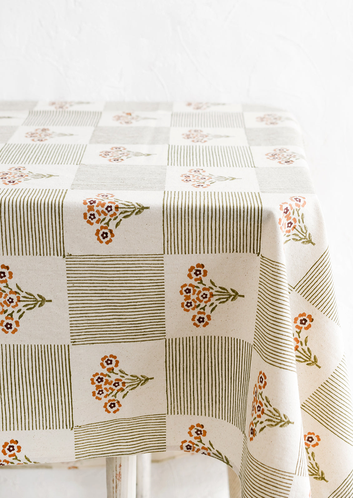 A floral check print cotton tablecloth.