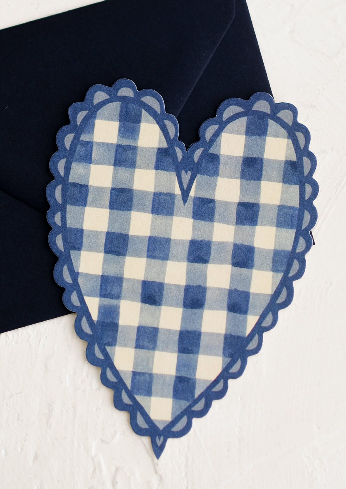 A heart shaped card in blue gingham print.