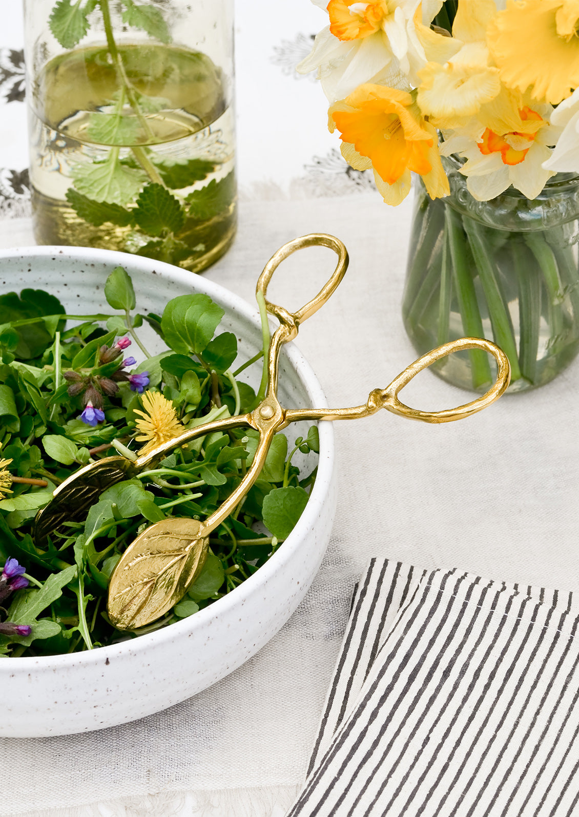 An al fresco dining scene with a salad.