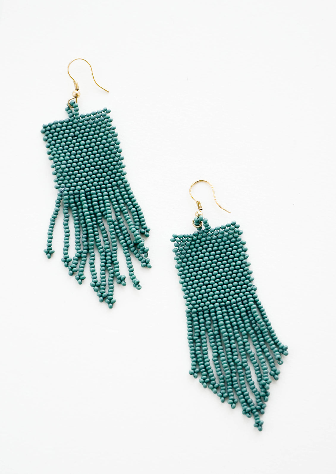 Teal rectangular taper fringe beaded earrings.